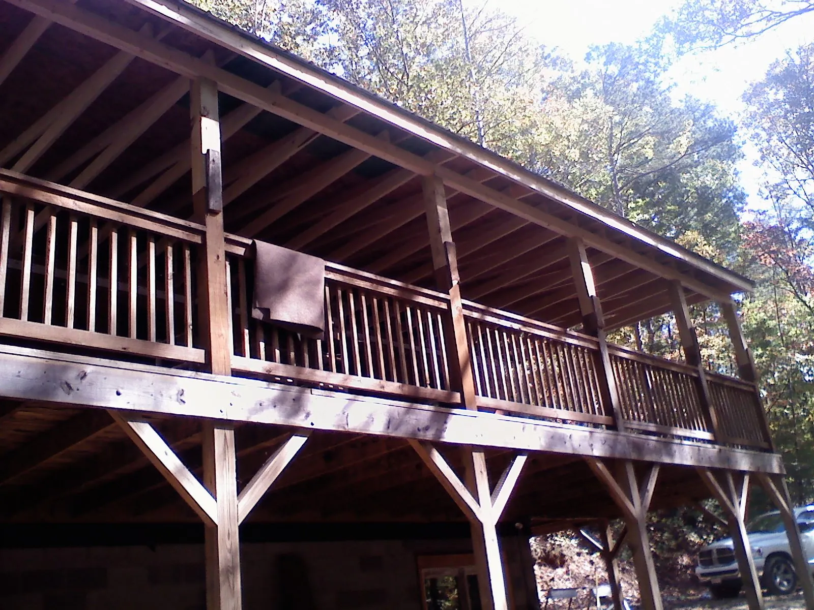 Timber framing under a new elevated porch and deck — Roof Leak Repair in Rappahannock Academy by Roofing Brothers